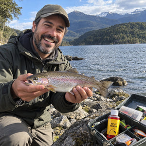 Pescador con trucha